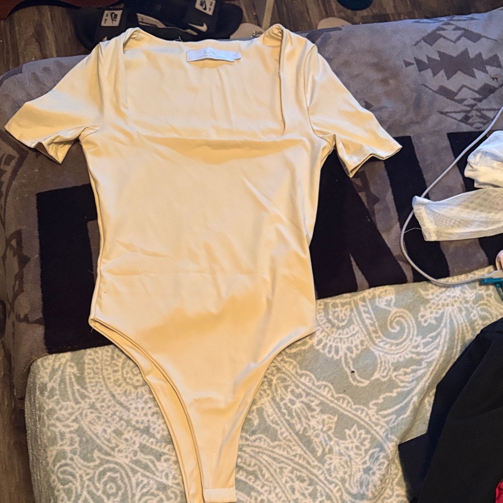 Elegant Cream Bodysuit for Women